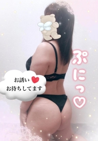 背中を
